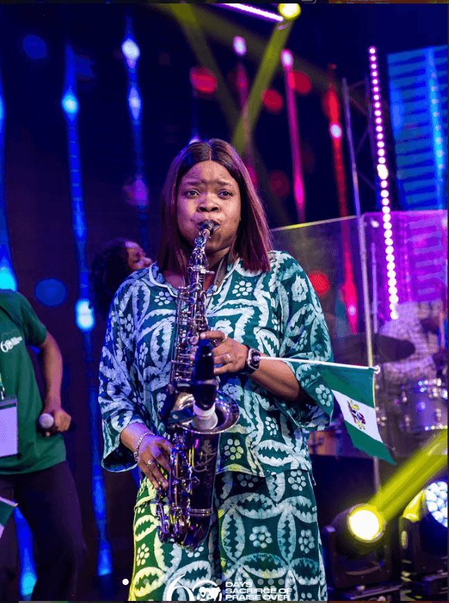 Playing sax with Nigerian flag